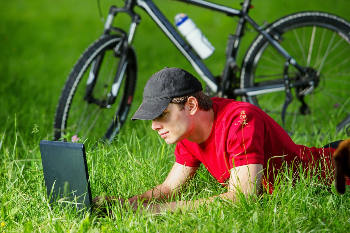 Working Outdoors on Computer Laptop